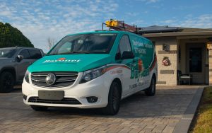 bayonet-van-parked-in-front-of-homeowners-garage
